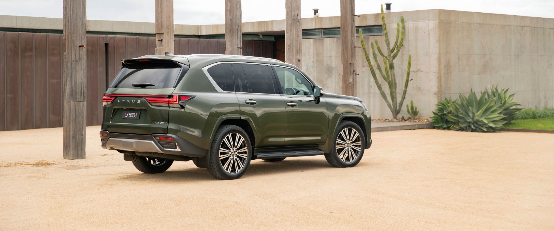 LX on a sandy driveway